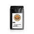 Best coffee sample pack featuring Fresh Roasted Coffee from The Mesquite Bean in a sleek black bag.